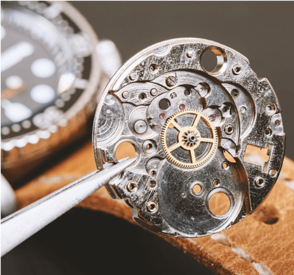 Reparatur eines Uhrwerks